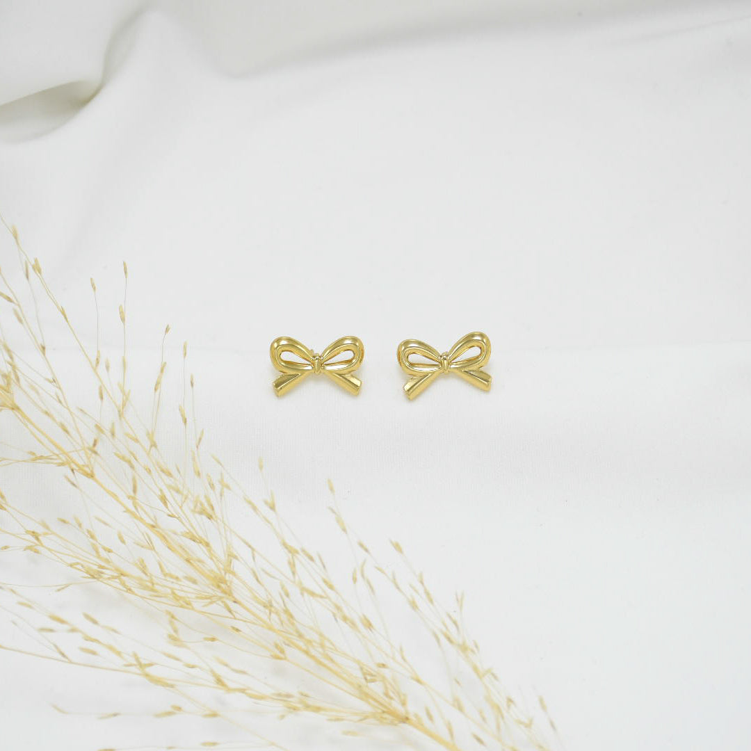 ARETES CHUNKY GOLD COQUETTE