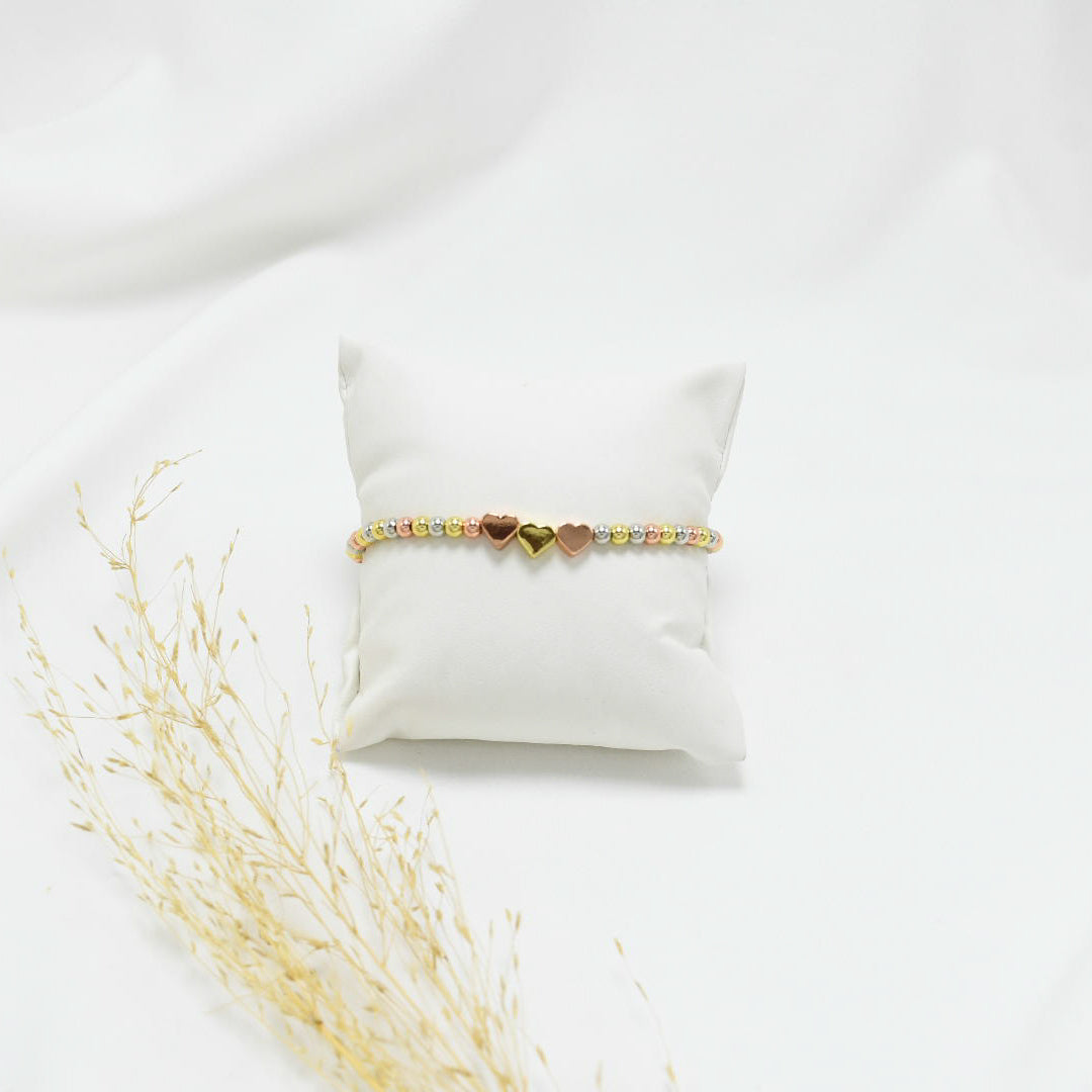 PULSERA REGULABLE DE HILO TRÍO DE CORAZONES