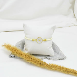 PULSERA DE HILO CREMA LOVE
