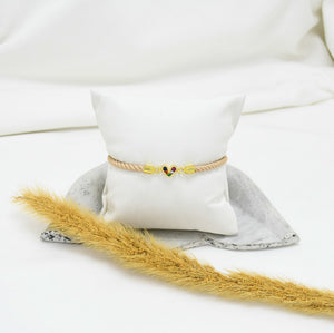 PULSERA DE HILO BEIGE AMORE