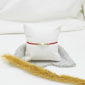 PULSERA DE HILO RED AKIRA