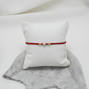 PULSERA DE HILO PUNTO DE LUZ