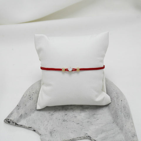 PULSERA DE HILO PUNTO DE LUZ