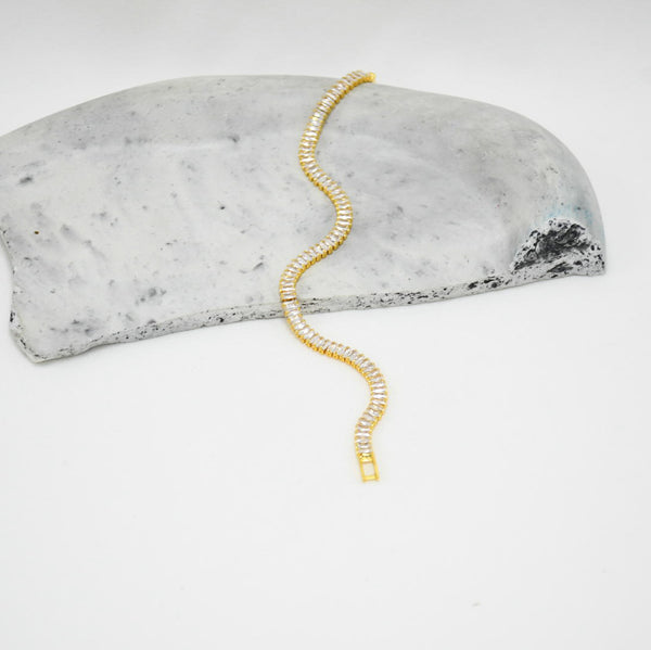 PULSERA GOLD TENNIS RAVEN